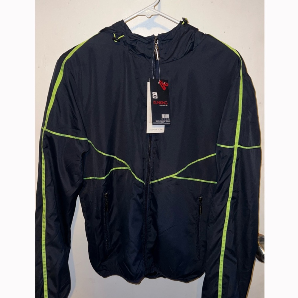 Lightweight Windbreaker. Never used. Foreign
